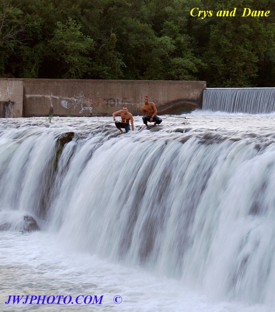 Kneeling at top of Falls